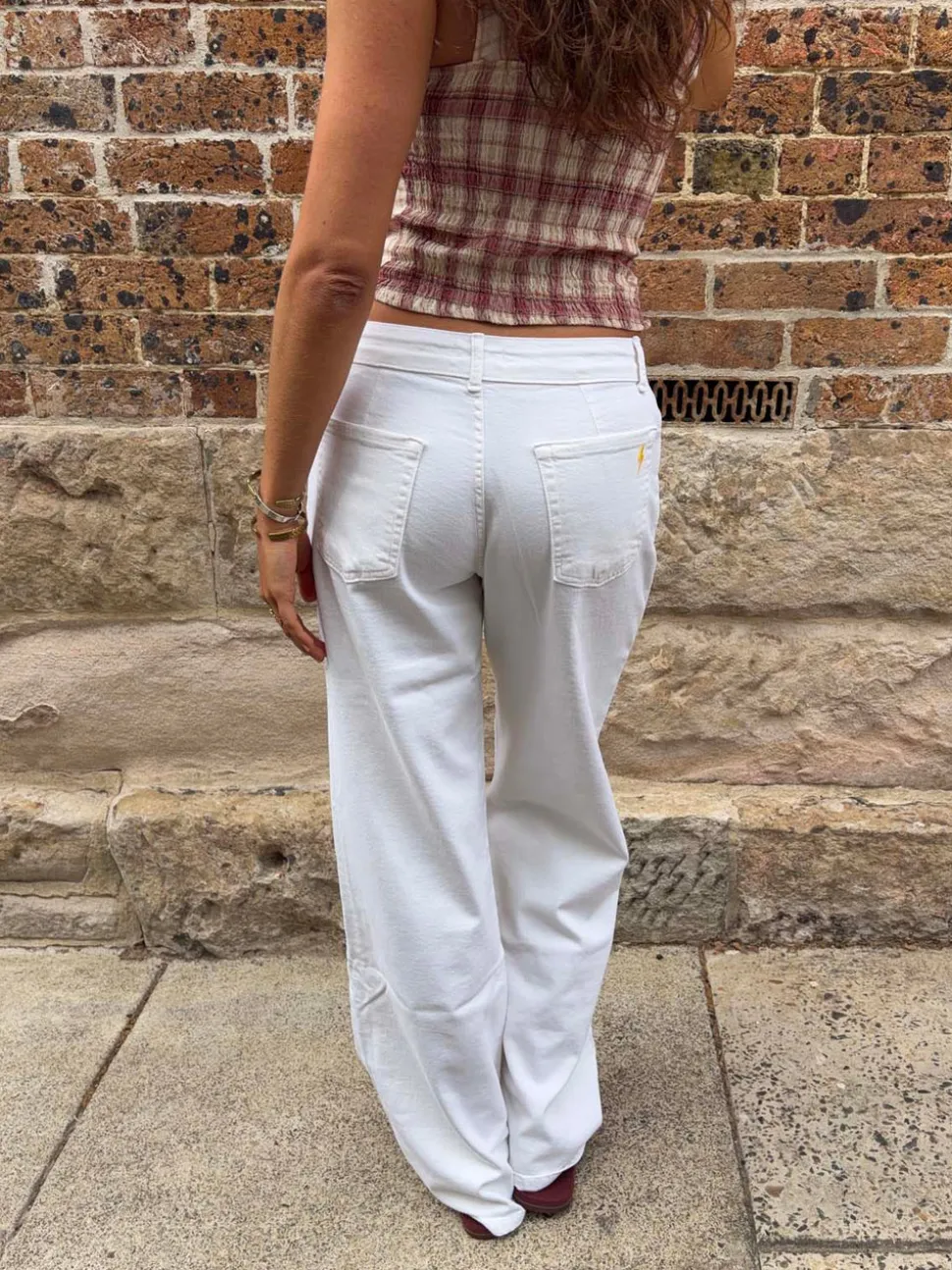 Alaia lavtaljede jeans med lyn detalje - Hvid denim